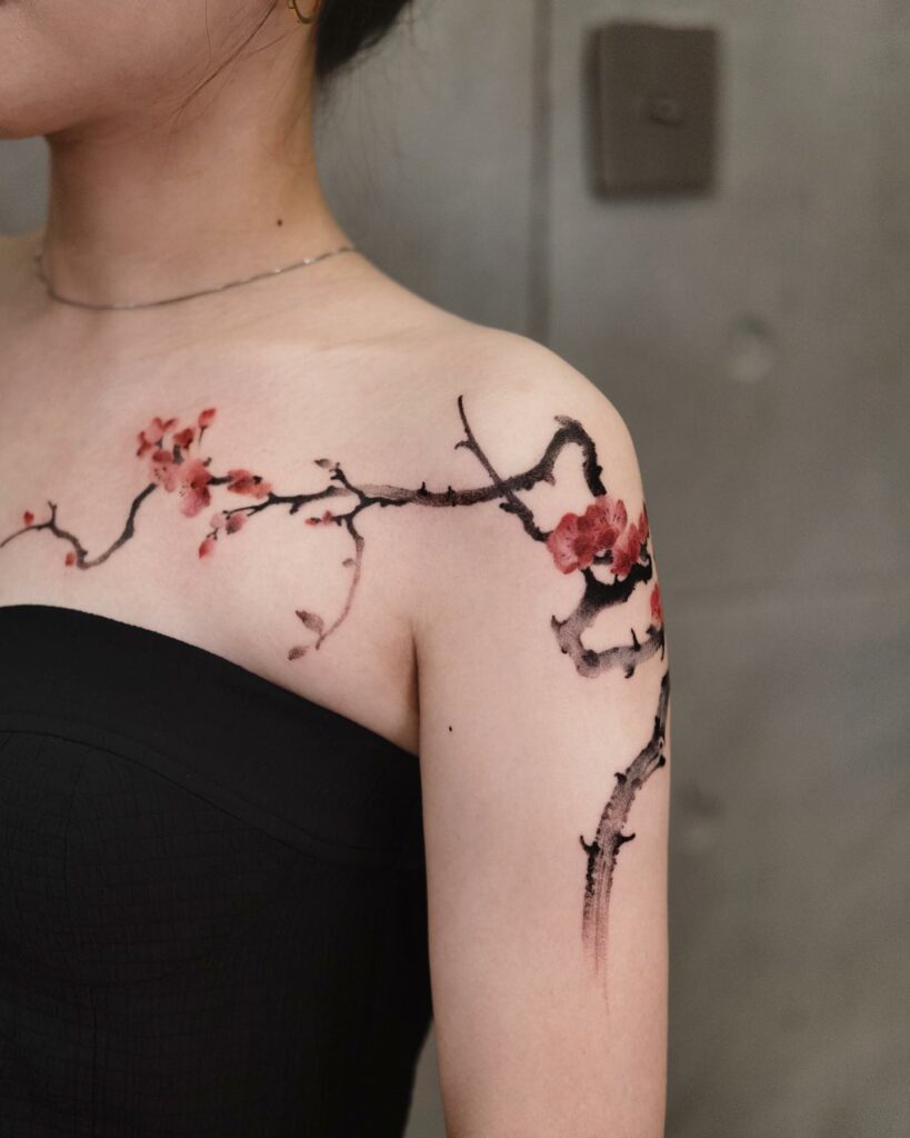 fleur de cerisier rouge tatouage